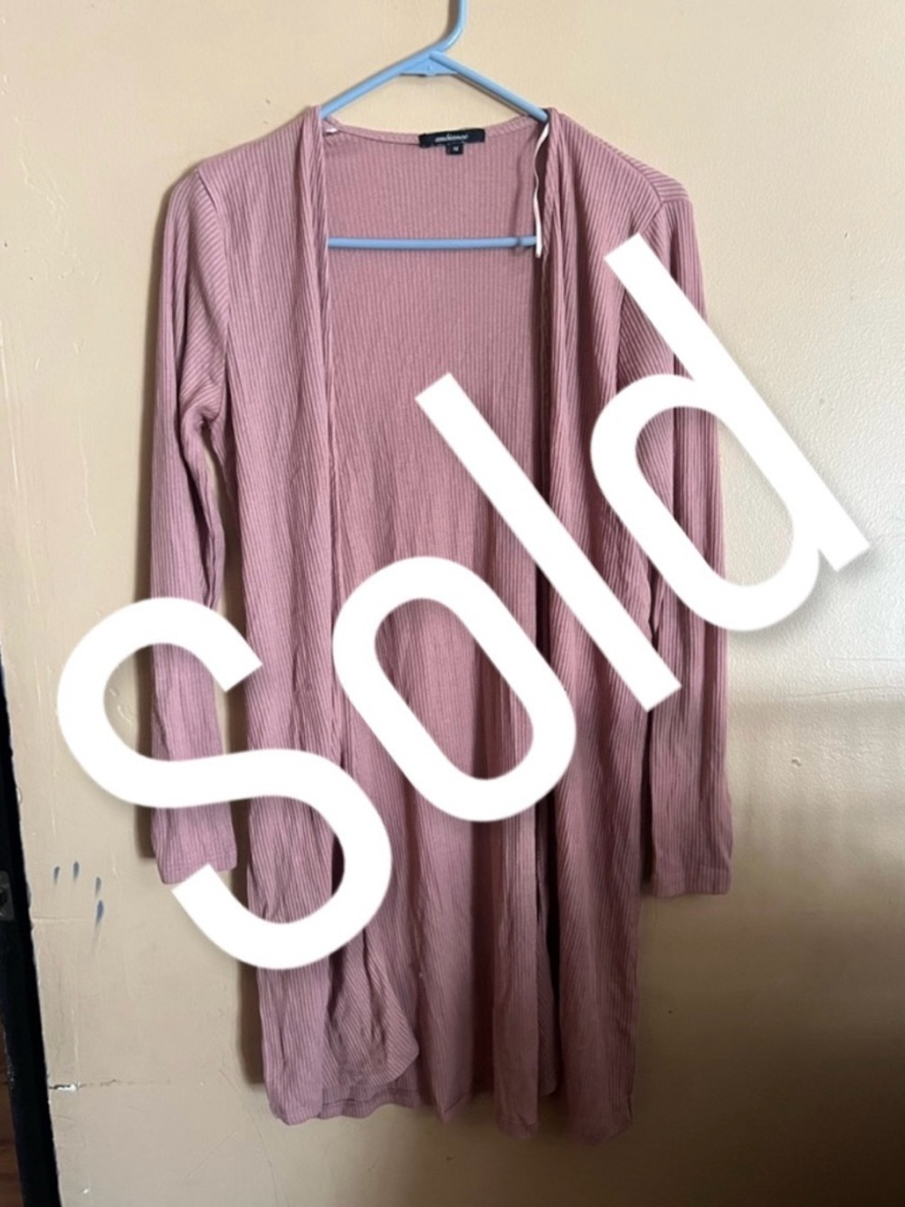 24. Lilac ribbed cardigan